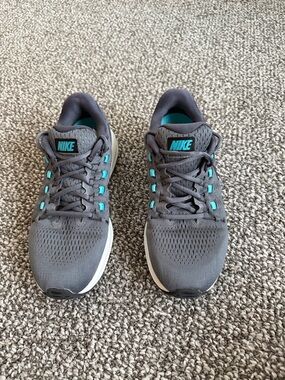 Nike Dark Gray Running Sneakers with Teal Accents